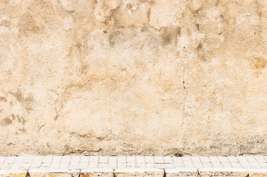 Background scene of vintage wall with sidewalk and copy space
