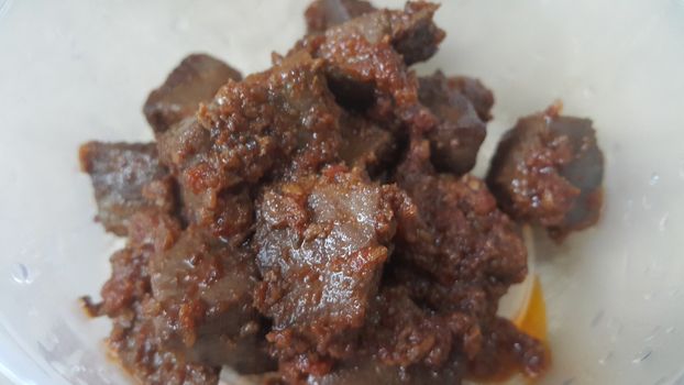 A close up view of Stewed chicken liver withspices  on it, a traditional home made delicious liver dish