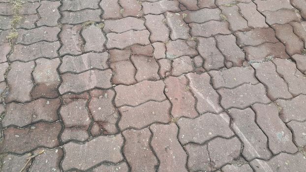 Perspective View of Colorful Brick Stone Street Road. Sidewalk, Pavement Texture Background