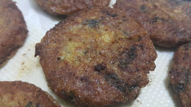 Close up view of delicious spicy fried kebab, Asian fast food recipe at home.  Food background for text and advertisements