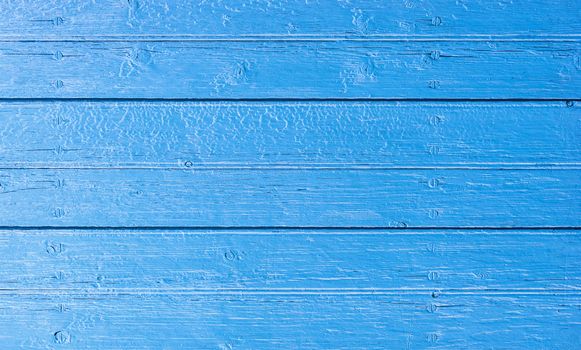 Rustic blue colored wood background texture with copy space