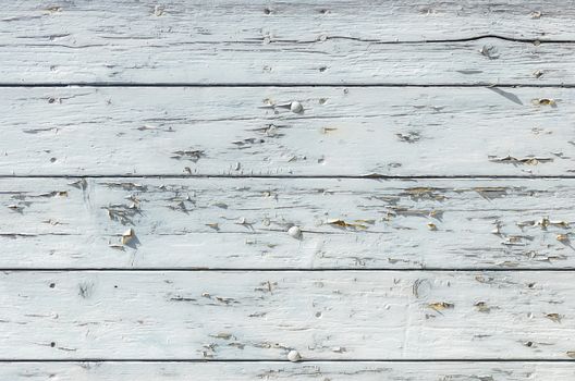 Old white wooden planks for background texture