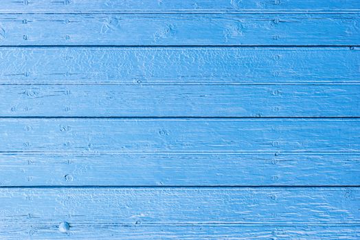 Blue painted wooden planks background texture with copy space