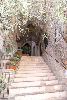 assisi,italy july 11 2020 :architecture of streets and buildings in the historic center of assisi