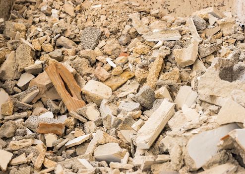 Stack of building rubble, construction industry background texture