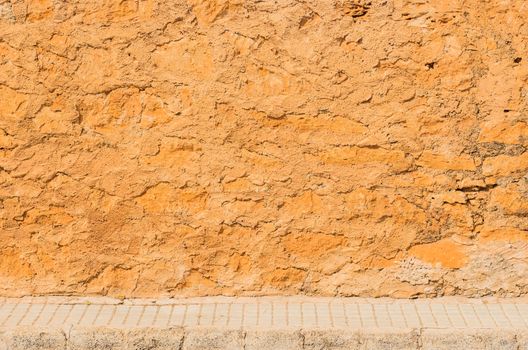 Background texture of vintage wall with pavement and copy space