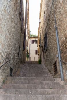 assisi,italy july 11 2020 :architecture of streets and buildings in the historic center of assisi