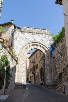 assisi,italy july 11 2020 :secondary door in street areatino village of assisi