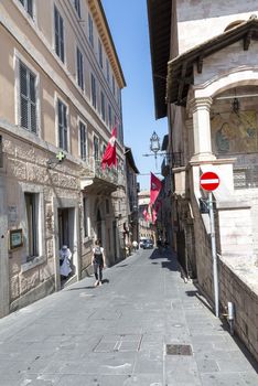 assisi,italy july 11 2020 :architecture of streets and buildings in the historic center of assisi