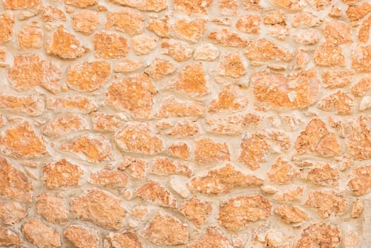Natural stone wall background structure, close up