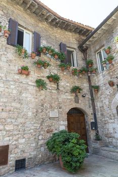 assisi,italy july 11 2020 :architecture of streets and buildings in the historic center of assisi