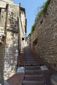 assisi,italy july 11 2020 :architecture of streets and buildings in the historic center of assisi