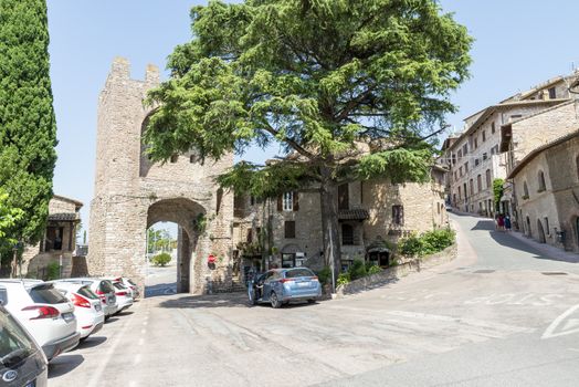 assisi,italy july 11 2020 :one of the many in the town of assisi brings saint peter