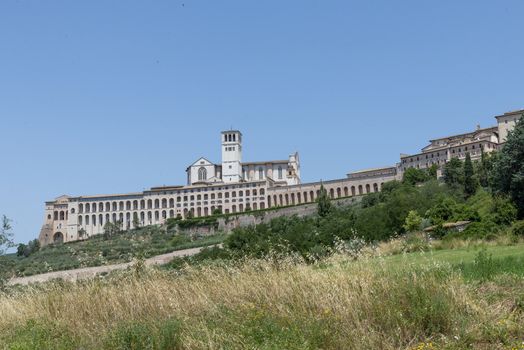 assisi,italy july 11 2020 :landscape of assisi seen from outside the country
