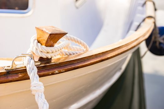 Detail view of rope cleat on boat deck
