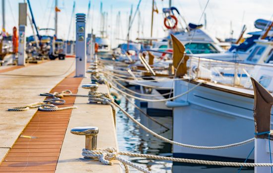 Sailing boats moored at the pier in Portocolom on Mallorca, Spain Balearic islands