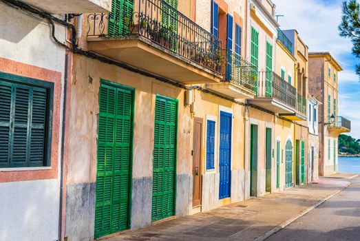 Street with traditional houses at the old town of Portocolom on Mallorca, Spain Balearic islands
