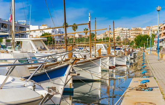 View of anchoring boats at the harbor of Porto Christo on Mallorca island, Spain
