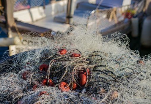Close-up of commercial fishing net at harbor