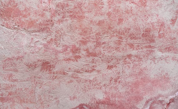 Vintage colored wall background with rustic weathered plaster texture 