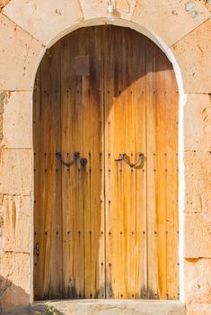 Close-up of old wooden front door residence entrance