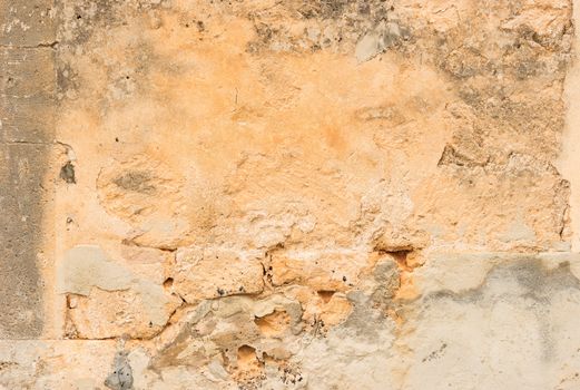 Close-up of old damaged wall plaster background texture