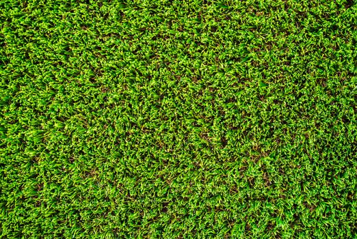 Background texture of green artificial grass