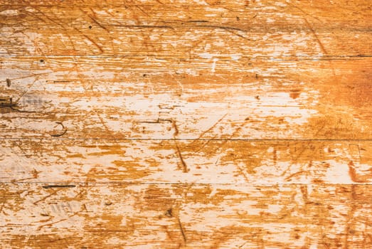 Old scratched wooden table surface texture with copy space