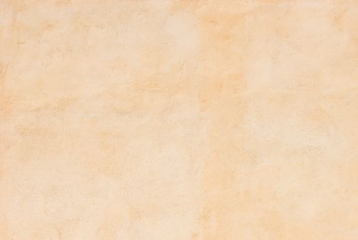 Light brown beige wall plaster background texture with copy space