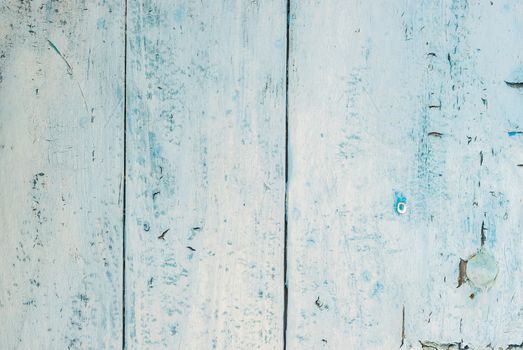 Vintage light blue wooden planks background texture with copy space

