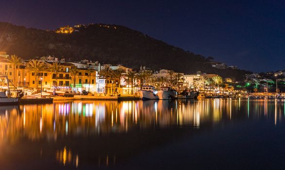 Idyllic view of the illuminated waterfront of Port de Andratx on Mallorca island at night