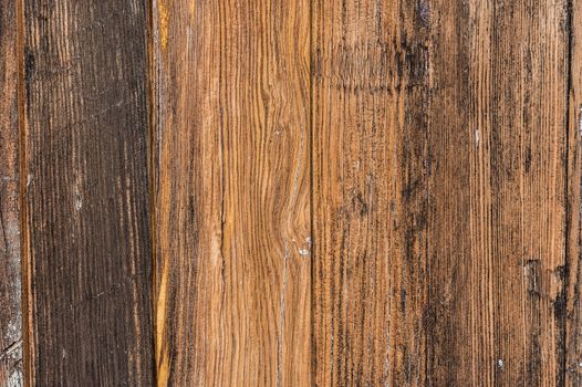 Old grunge black and brown weathered wood texture background 