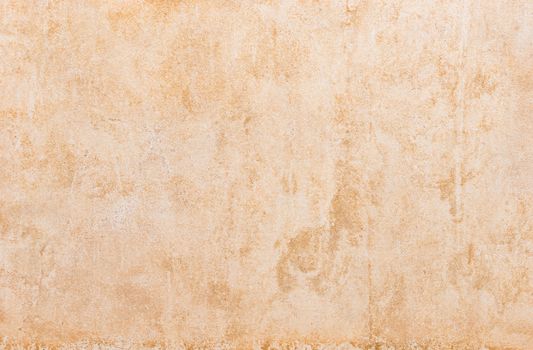 Light brown mediterranean wall background texture with copy space