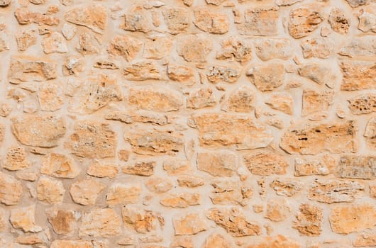 Stone wall background texture, structure close-up