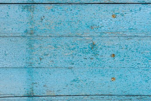 Old blue painted wooden planks background texture with copy space
