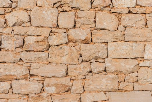 Vintage gray stone wall background texture, close-up