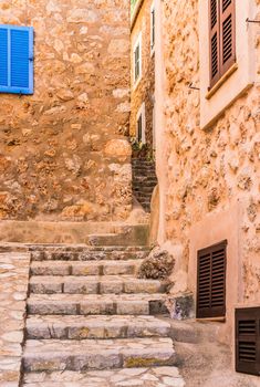 View of an rustic stone staircase steps in old mediterranean village