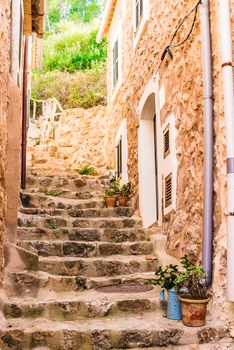 Detail view of old stone staircase steps in mediterranean rustic village