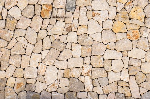Stone wall background texture, structure close-up