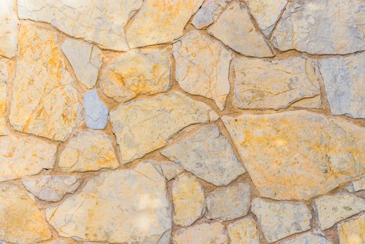 Vintage stone wall background texture, close-up