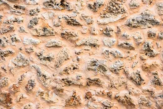 Stone wall background texture, structure close-up
