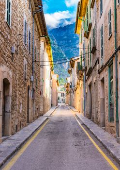 Narrow street at the mediterranean town of Soller on Mallorca, Spain Balearic islands