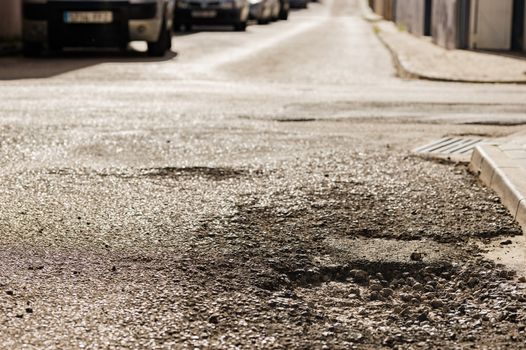 Pot hole on asphalt road