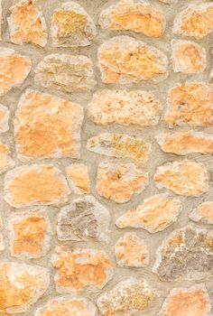 Natural vintage stone wall background texture, close-up