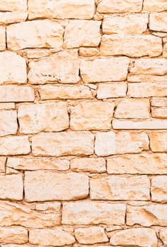 Rustic old stone wall texture background structure