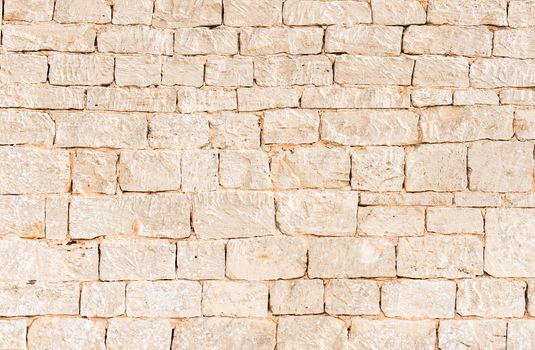 Rustic old stone wall texture background structure