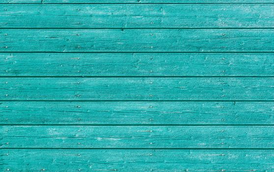 Teal painted wooden planks background texture with copy space

