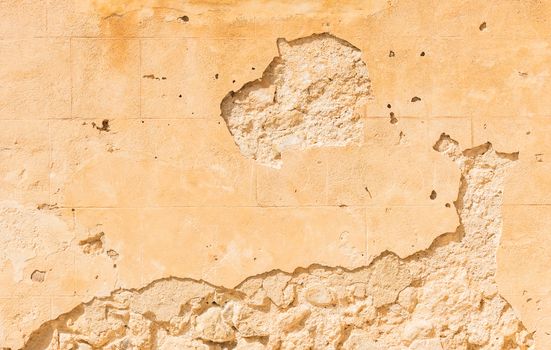 Vintage rustic damaged wall backdrop texture, close-up