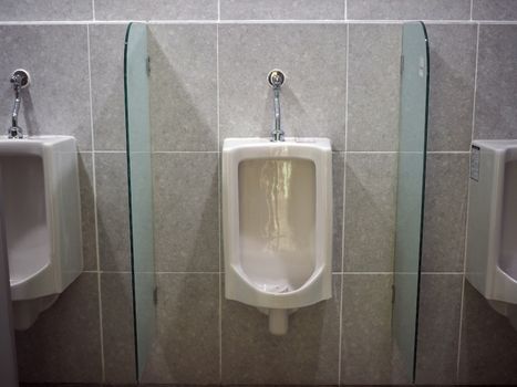 Urinal in public toilets Is white and clean at all times To prevent germs.