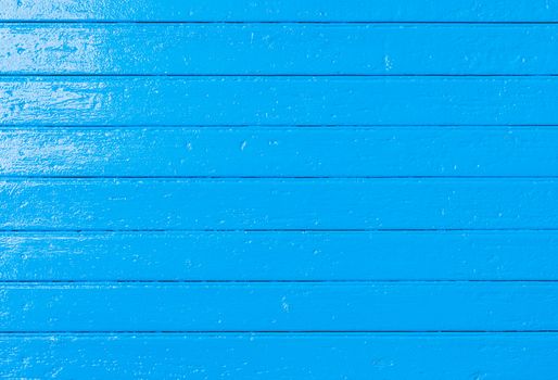 Blue painted wooden planks background texture with copy space